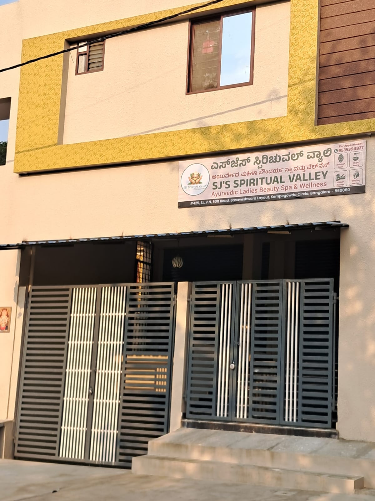 SJ's Spiritual Valley — spa entrance and signboard, #425 50ft Road Basaveshwara Layout Bangalore